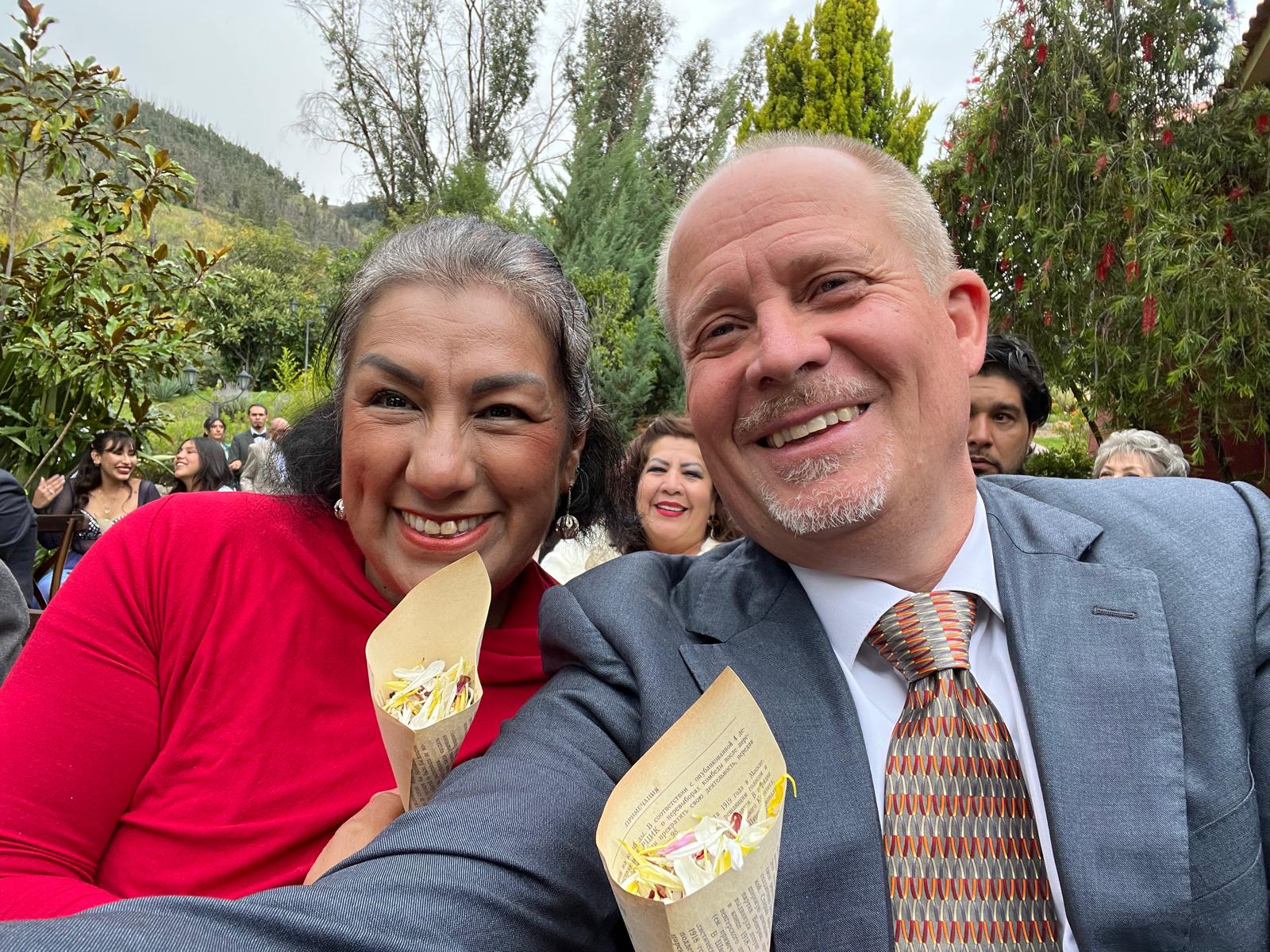 David and Violeta Larson together at a garden ceremony